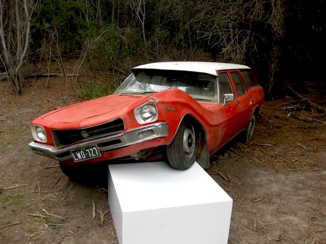 Car on plinth - art exhibit